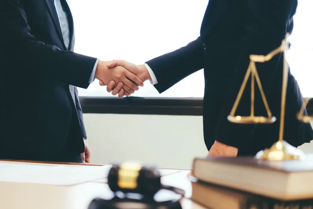 attorneys-shaking-hands-winterberg-law-firm