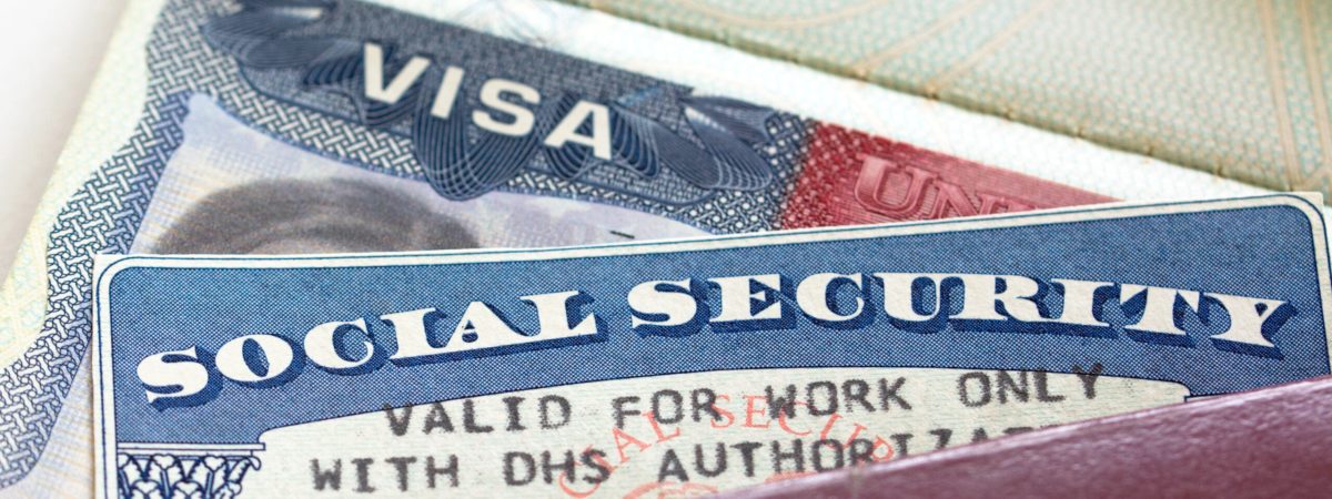 American Visa and Social Security Card with '"Valid for work only with DHS authorisation"'