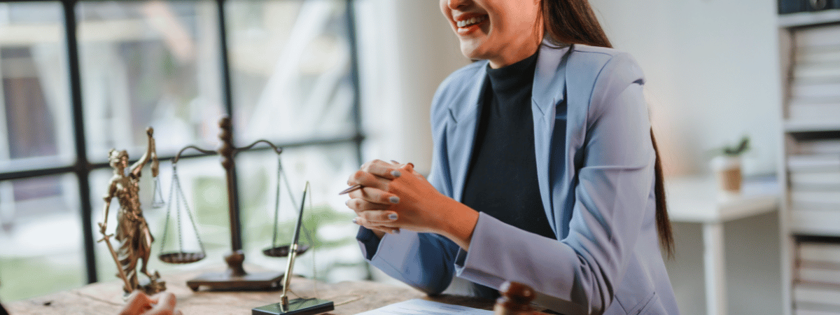 A woman in an immigration lawyer's office