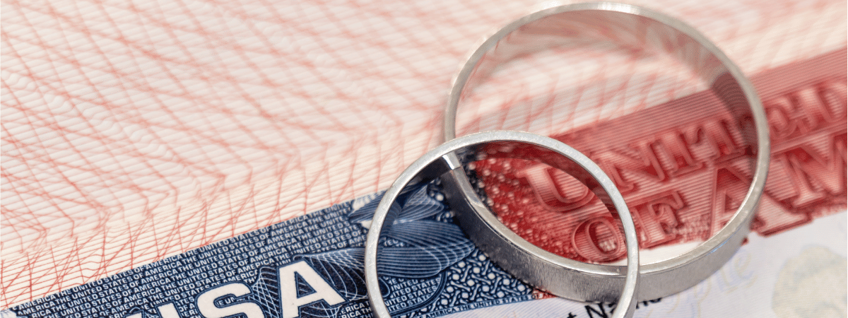 A pair of wedding rings on a U.S. visa