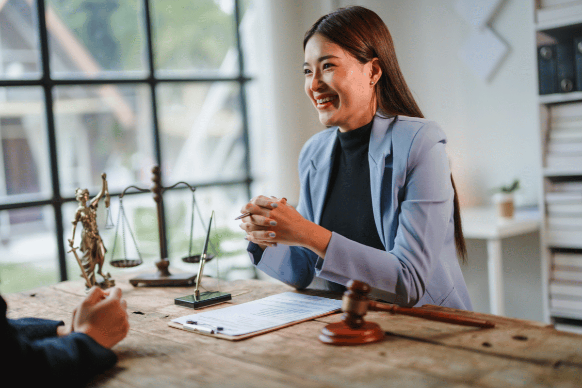 A woman in an immigration lawyer's office