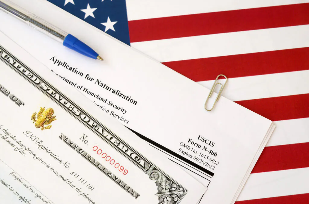 An American flag with a naturalization application on top of it in El Paso.